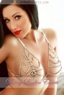 Kiera escort - 34DD bust, brunette hair, brown eyes